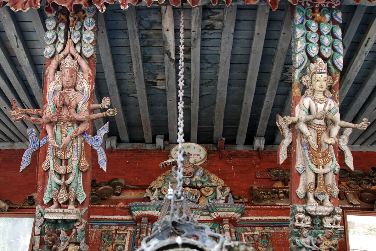 Kathmandu Patan 02-5 Rato Red Machhendranath Temple North Doorway Carved Multi Armed Figures On The Roof Struts 